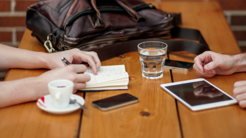 Meeting on wooden table