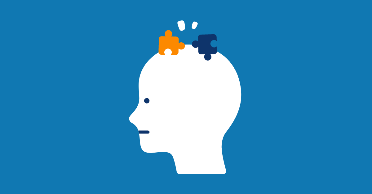 Against a blue background, we see a white cartoon face in profile. On top of its head sit two separate jigsaw puzzle pieces, one orange and one dark blue.